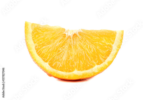 Juicy slice of fresh orange fruit isolated on white background