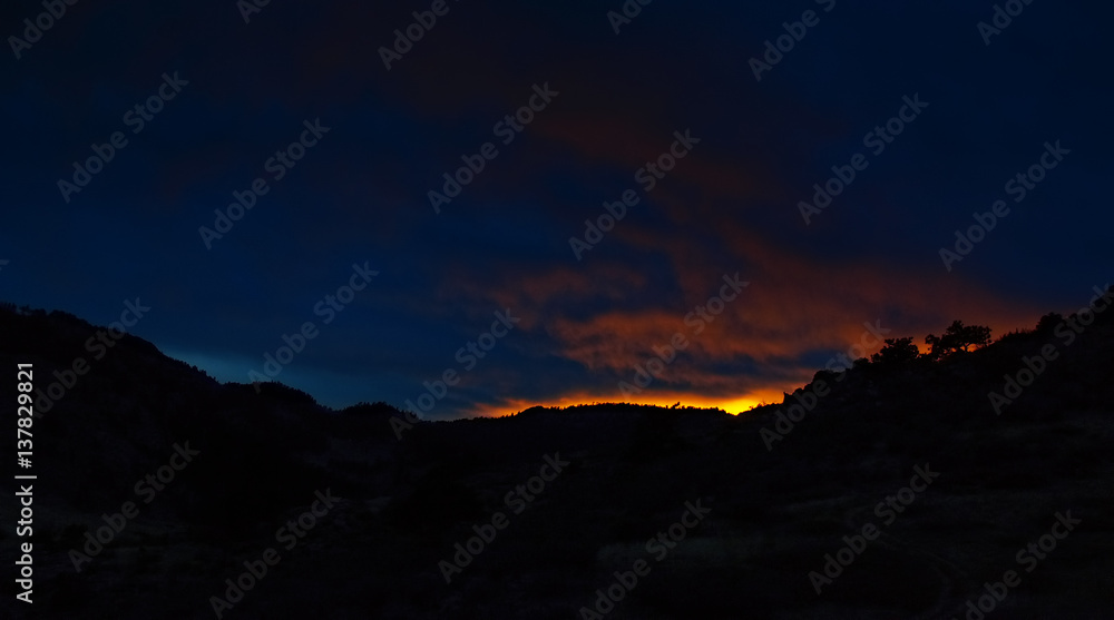 Sunset Over Cherokee Park - View of a sunset looking down Rabbit Creek Valley in Cherokee Park Colorado. Sunset Over Cherokee Park - View of a sunset looking down Rabbit Creek Valley in Cherokee Park Colorado.