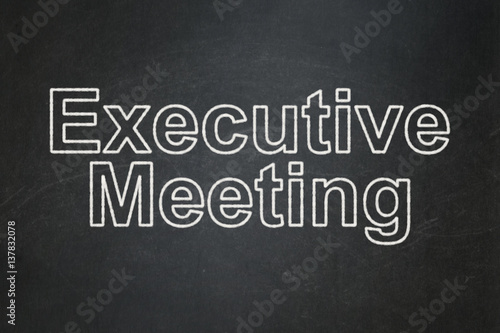 Business concept: Executive Meeting on chalkboard background