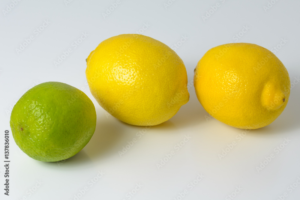 Lemons and limes on a white background. Lemons and limes on a white background.