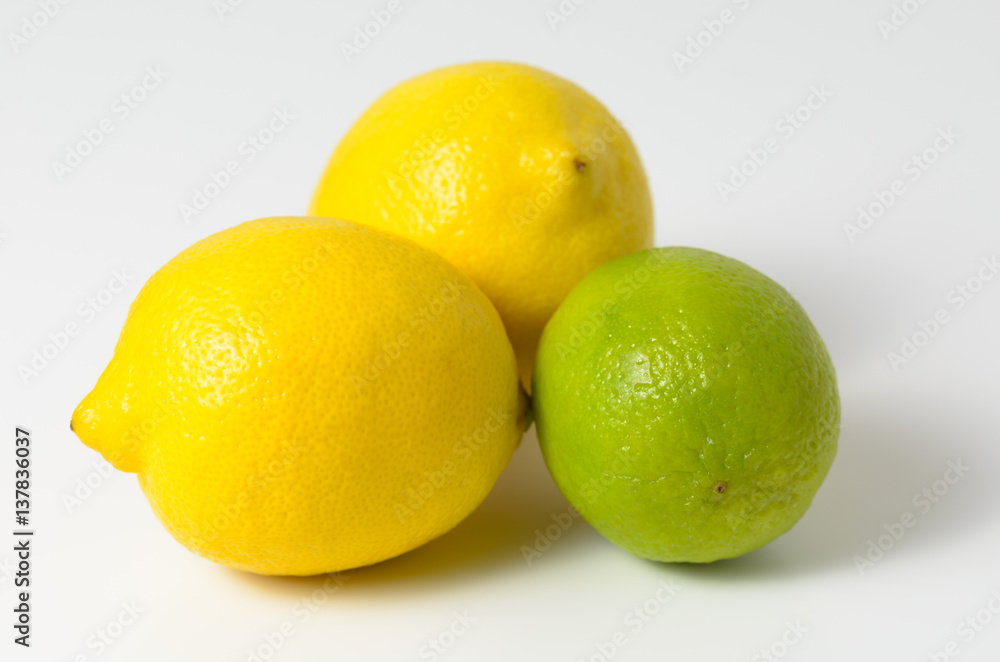 Lemons and limes on a white background. Lemons and limes on a white background.