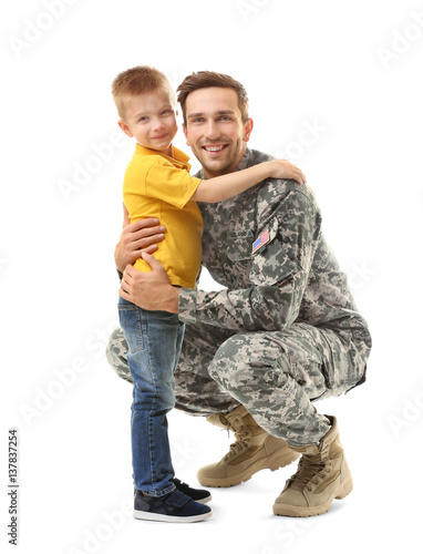 Military father with his so...