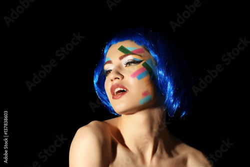 Portrait of young woman wit...