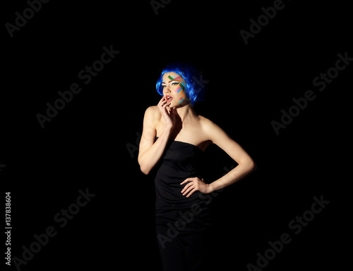 Portrait of young woman wit...