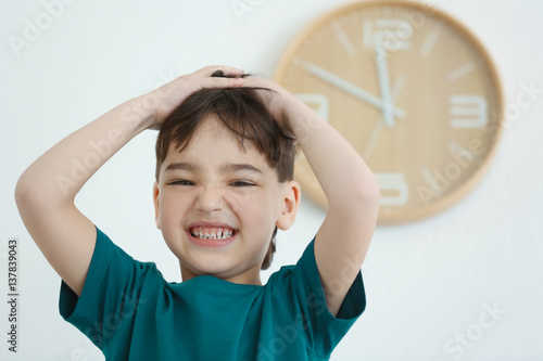 Cute little boy and wall wi...