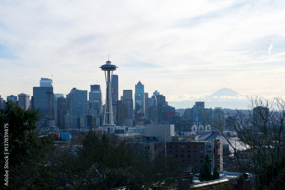 SEATTLE, WASHINGTON, USA - JAN 23rd, 2017: Seattle skyline panorama seen from Kerry Park during the morning light with Mount Rainier in the background