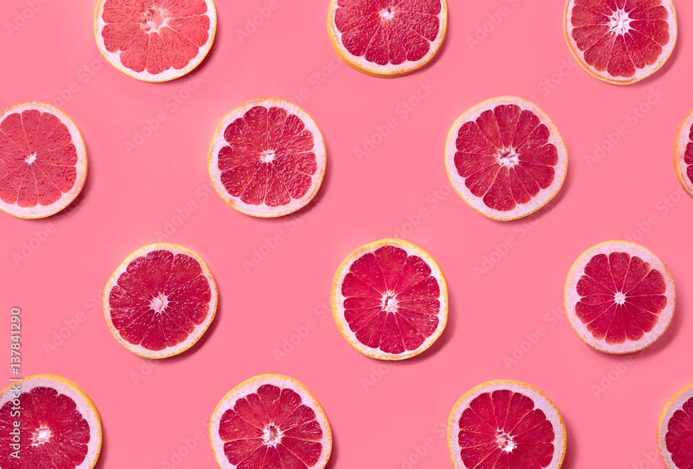 Colorful pattern of grapefruit slices - obrazy, fototapety, plakaty 