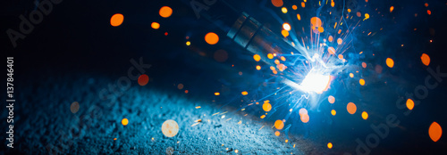 artistic welding sparks light, industrial background