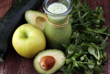 Healthy green smoothie and ingredients - superfoods, detox, diet, health, vegetarian food concept
