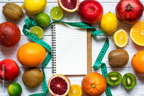 fresh fruits and vegetables for healthy diet on white wooden table