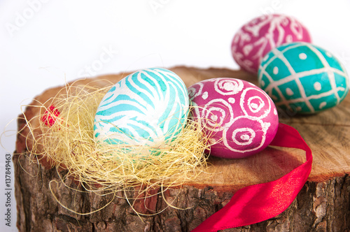 Closeup of beautiful Easter eggs with their hands. A festive mood. 
