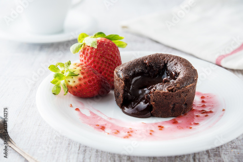Chocolate souffle with strawberries photo