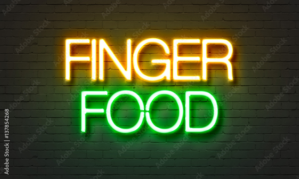 Obraz premium Finger food neon sign on brick wall background.