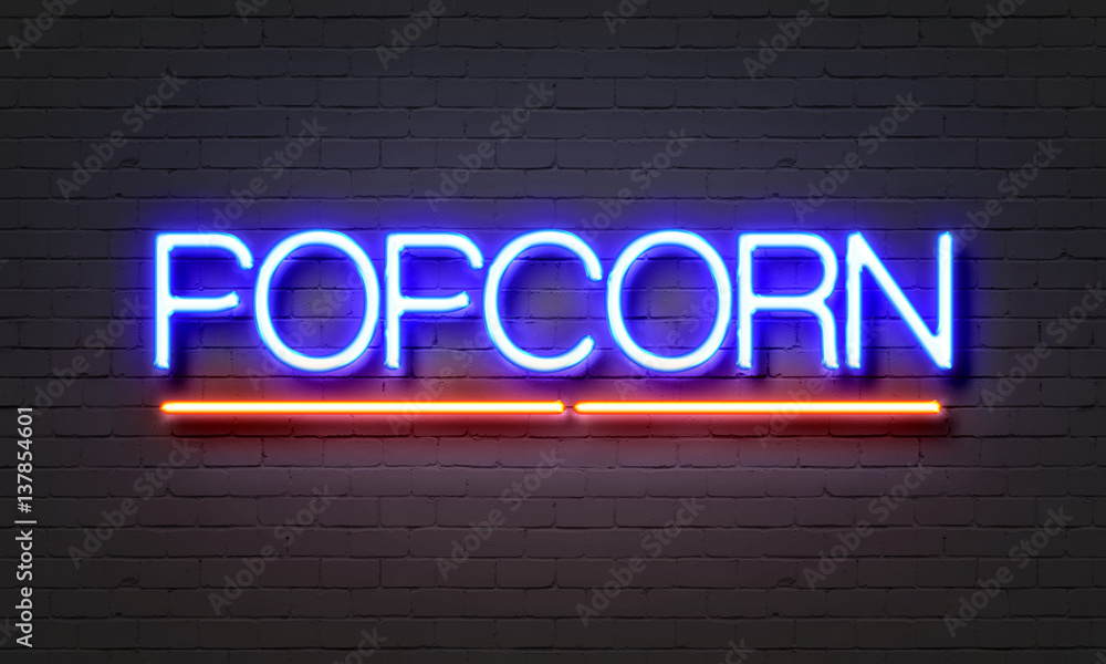 Obraz premium Popcorn neon sign on brick wall background.