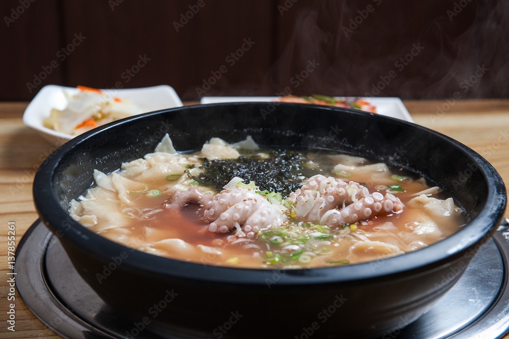 nakji sujebi. Hand-pulled Dough Soup with small octopus.