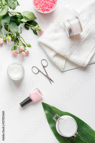 salt and cream for nail care in spa top view