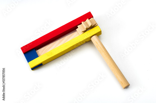 Judaism and religious holyday with wooden noisemaker or gragger (a traditional toy) for purim celebration holiday (jewish holiday) photo