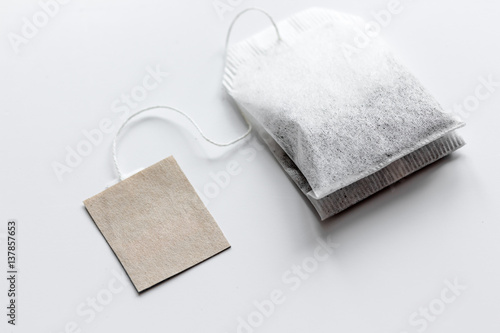 Close up teabag on white background mock-up photo