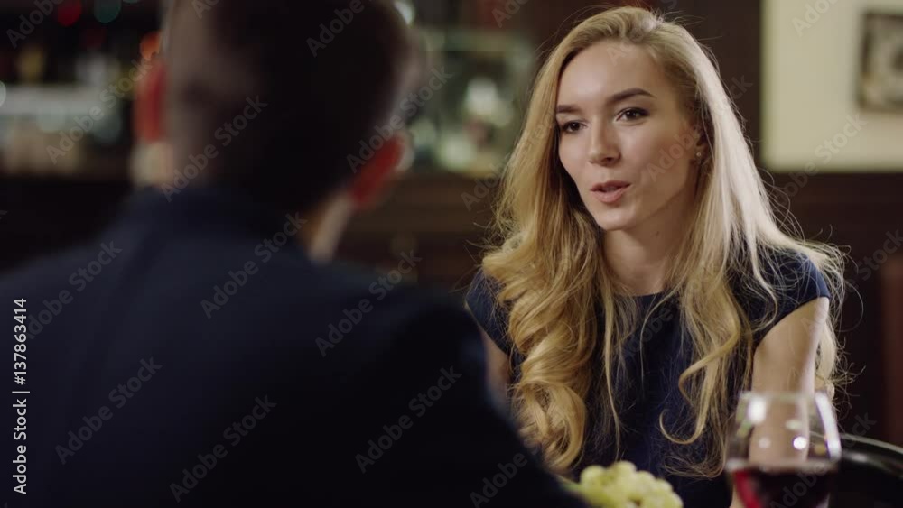 blondie telling story to partner in restaurant blondie telling story to partner in restaurant
