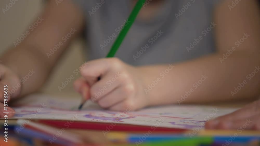 Closeup of family hands drawing colorful pictures, enjoying weekend together Closeup of family hands drawing colorful pictures, enjoying weekend together