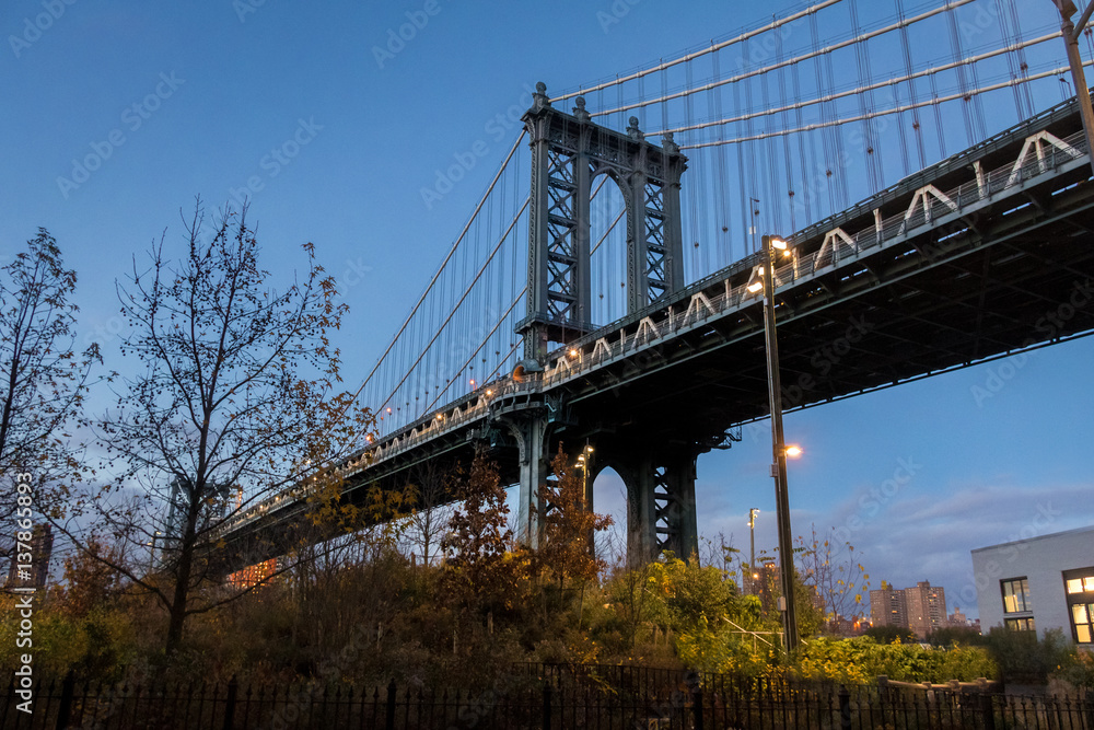 Manhattan Bridge seen from Dumbo on Brooklyn at sunset - New York, USA Manhattan Bridge seen from Dumbo on Brooklyn at sunset - New York, USA
