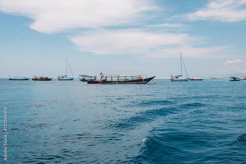 Asian boats in the Indian deep blue ocean Asian boats in the Indian deep blue ocean