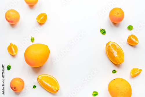 Fototapeta Naklejka Na Ścianę i Meble -  Orange fruits on white background top view mock up