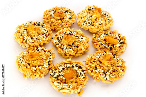 Rice Cracker with dried longan.white background.