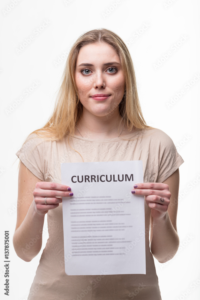 Young woman holding her resume Young woman holding her resume