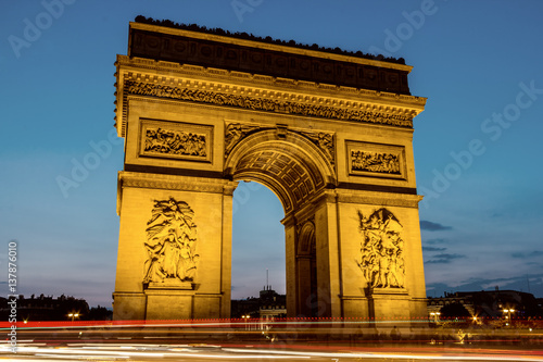 Night view of Arc de Triomphe, Paris photo