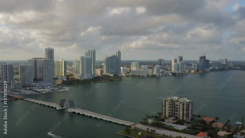 Miami Aerial v3 Flying over bay panning with cityscape, islands and south beach views. Miami Aerial v3 Flying over bay panning with cityscape, islands and south beach views.
