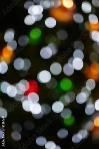 Lights blurred bokeh background from christmas tree