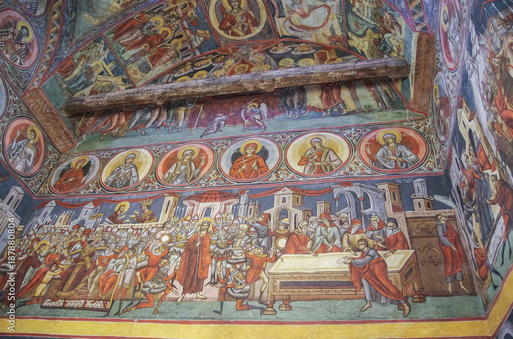 Frescoes inside church in monastery Voronet. One of Romania's painted Orthodox monasteries in southern Bucovina,region Suceava, Romania