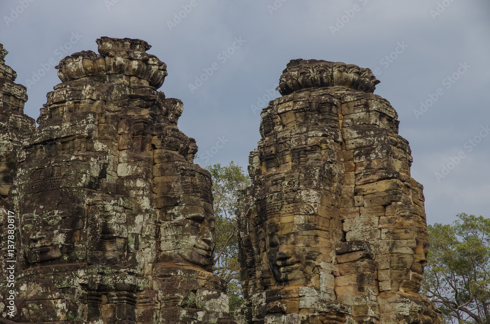 Face stone of ancient Bayon Temple in Angkor Wat, Siem Reap, Cambodia