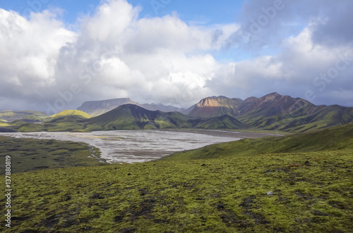 Lake and moss-covered volcanic mountains. Landmannalaugar. Iceland