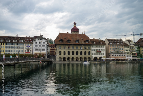 Luzerne, Switzerland - August 23, 2010: Traditional house on embankment of Reuss River in old town of Lucerne ( Luzerne )