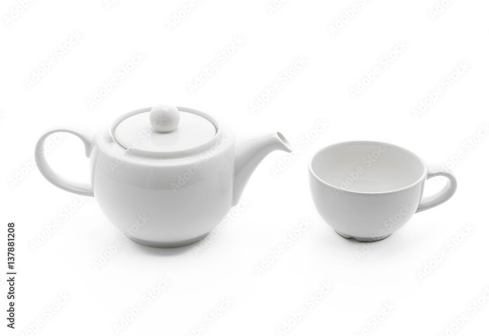 white tea pot with tea cup