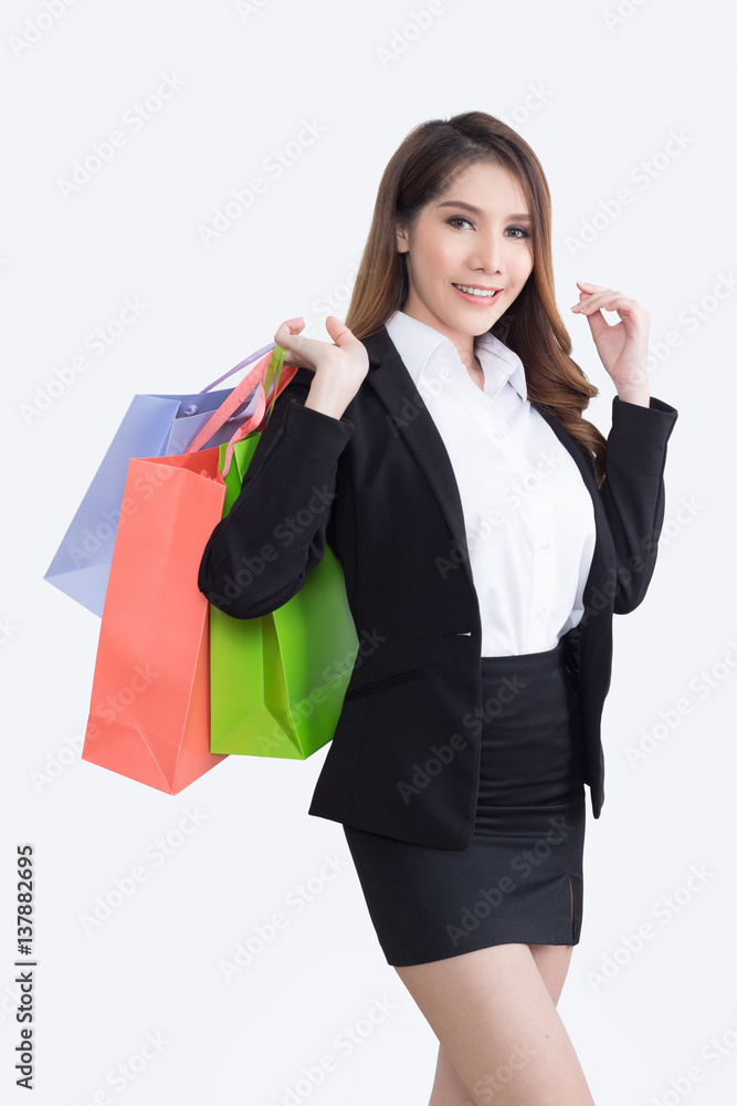 Beautiful businesswoman with shopping bags Beautiful businesswoman with shopping bags