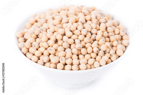 Soy beans in bowl on white