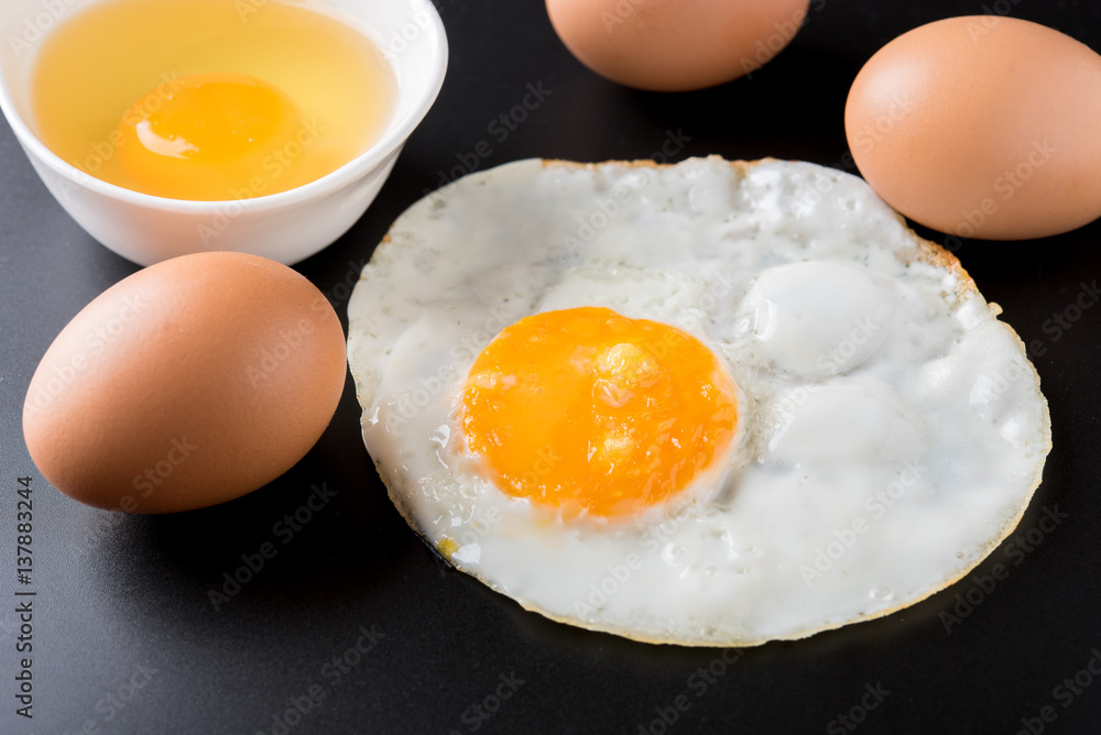fried eggs on black background, egg fried eggs on black background, egg