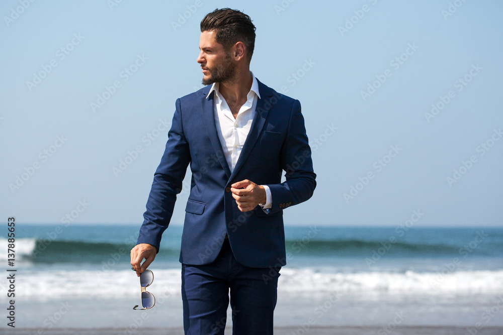 Elegant young handsome man. Outdoors fashion portrait. Elegant young handsome man. Outdoors fashion portrait.