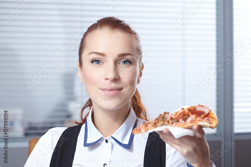 businesswomen with pizza