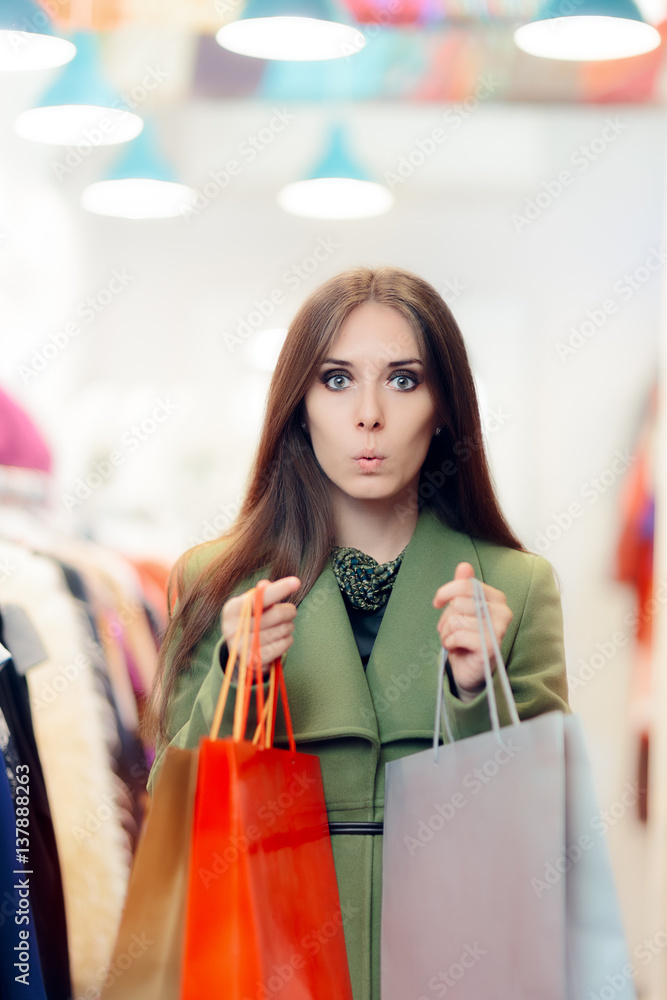 Surprised Shopping Woman Wearing a Green Coat in Fashion Store Surprised Shopping Woman Wearing a Green Coat in Fashion Store