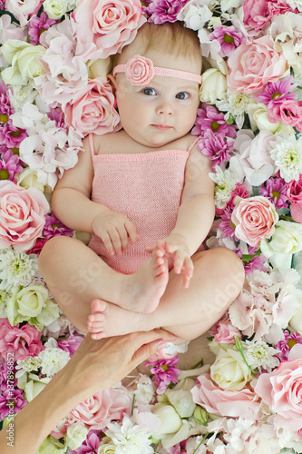Little baby and flowers 