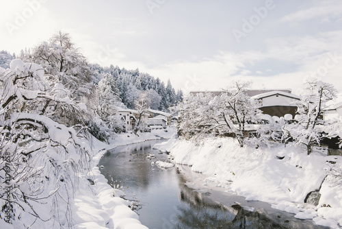 River surrounded with snow at Takayama
