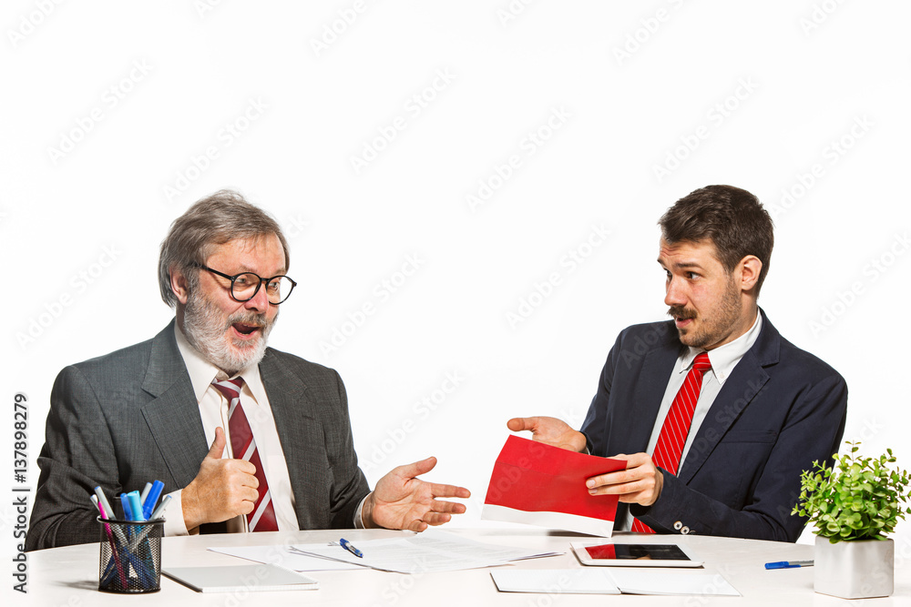 Concept - corruption. Businessman in a suit taking a bribe Concept - corruption. Businessman in a suit taking a bribe