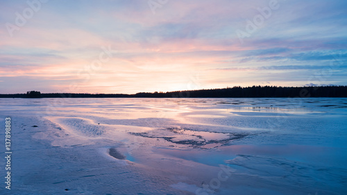 Sunset lake in winter