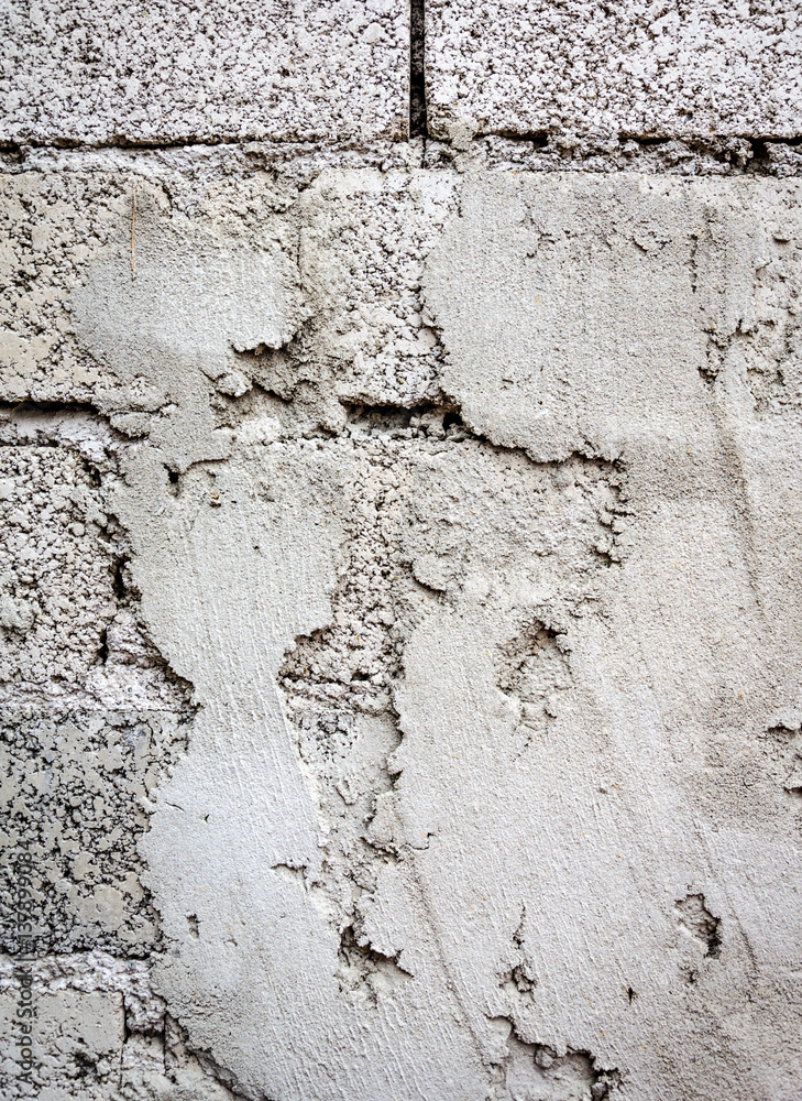 Fototapeta premium concrete texture, the background with a wall of concrete blocks in gray shades