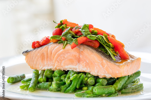 Baked salmon with green beans and vegetables