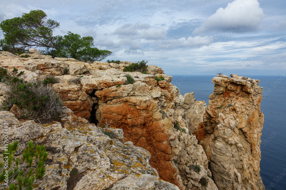 Rock cliff near sea in Ibiza Rock cliff near sea in Ibiza